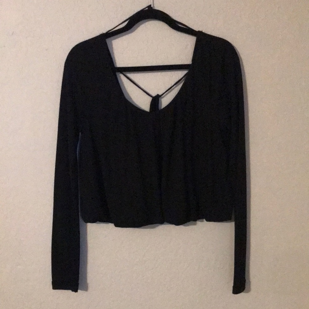 We the free top size small